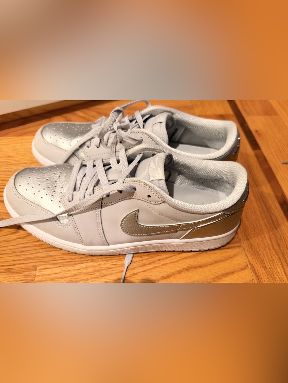 Nike in Light Gray with Metallic silver Swoosh